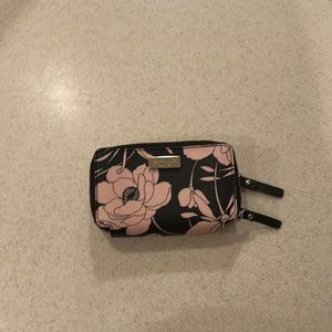 A barely used Kate Spade double-zipper wallet.